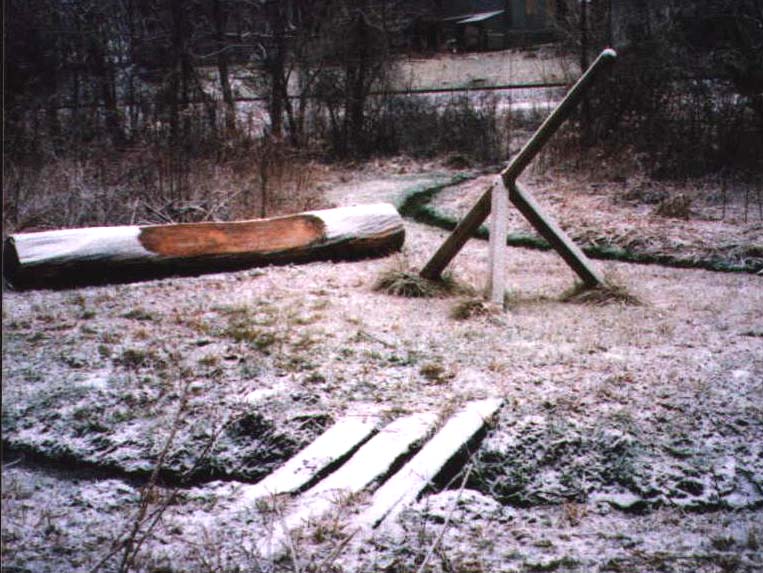 Looking a little like a giant praying mantis, this sundial stands ready on a wintry day.